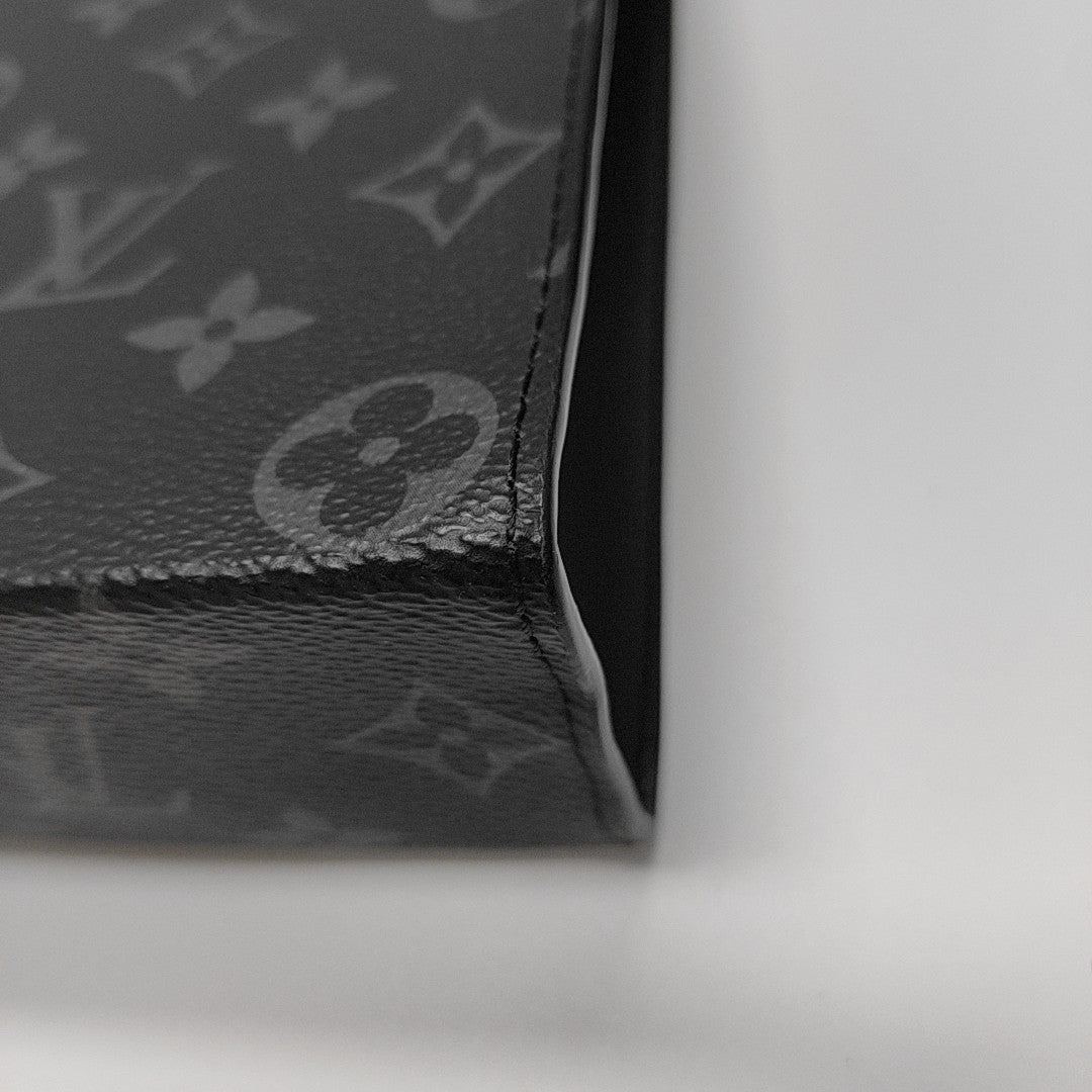 Pochette Voyag MM Monogram Coated Canvas Black