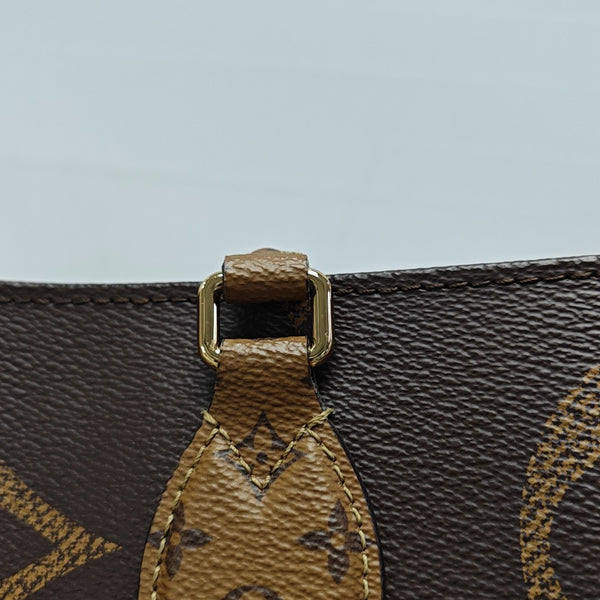 ONTHEGO GM Monogram Coated Canvas Brown