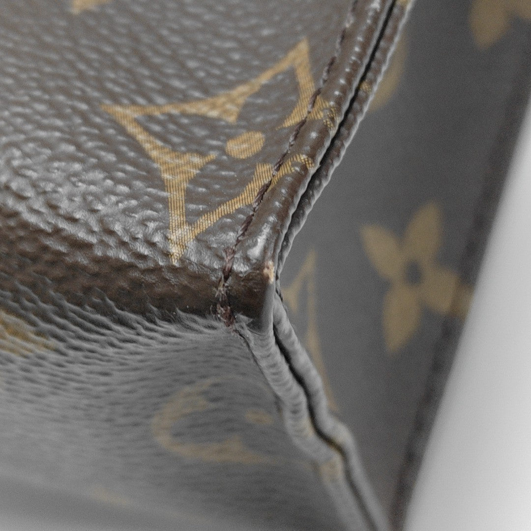 TOILET POCKET 26 Monogram Coated Canvas Brown