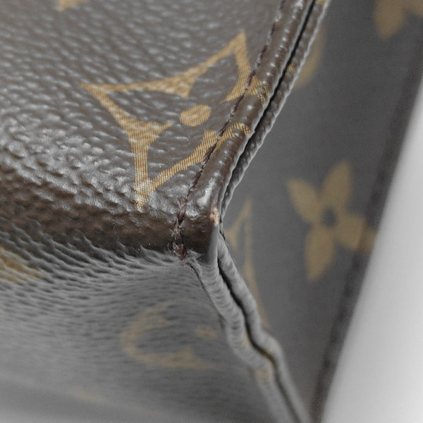 TOILET POCKET 26 Monogram Coated Canvas Brown