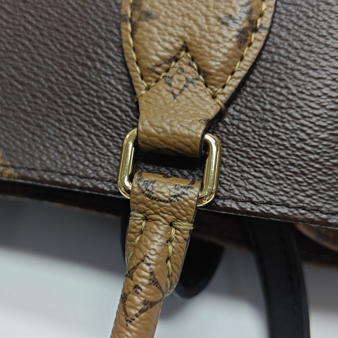 ONTHEGO MM Monogram Coated Canvas Brown