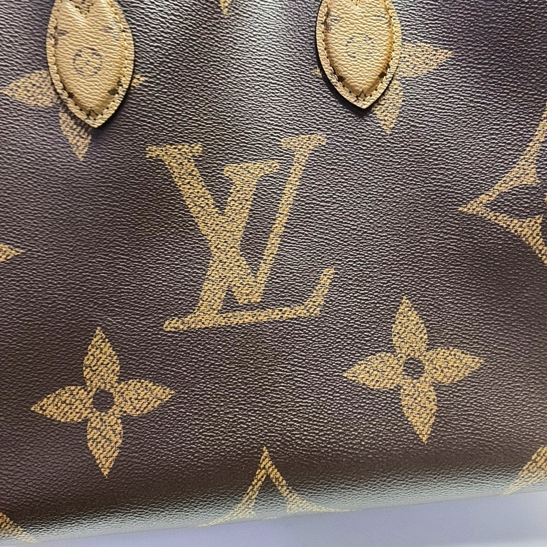 ONTHEGO MM Monogram Coated Canvas Brown