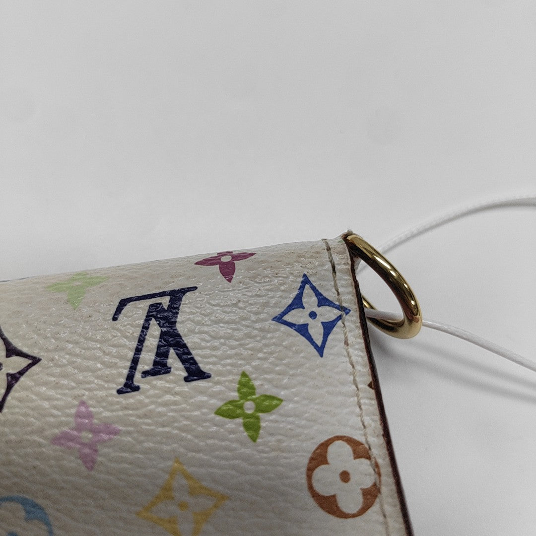LV × TM INSOLITE Monogram Coated Canvas White