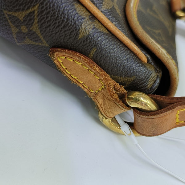TIKAL Monogram Coated Canvas Brown