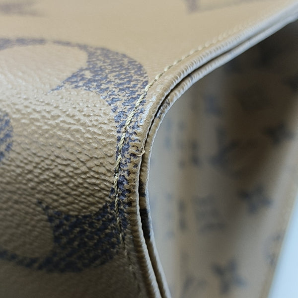 ONTHEGO MM Monogram Coated Canvas Brown