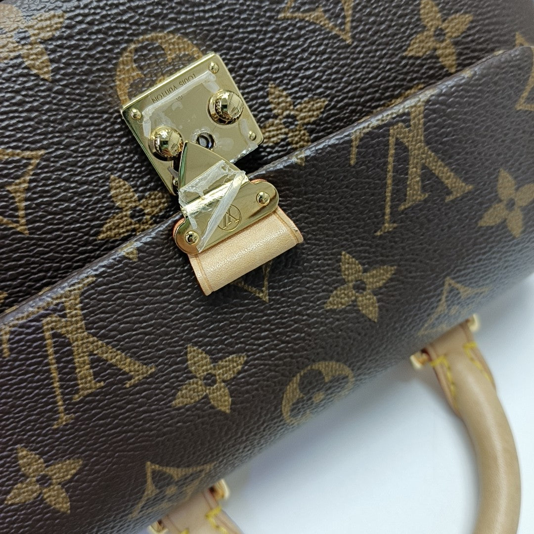 MADELEINE Monogram Coated Canvas Brown