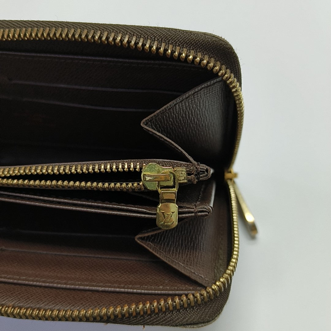 ZIPPY Damier Ebene Coated Canvas Brown Wallet