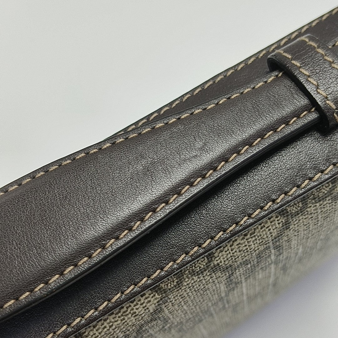 GG Supreme Monogram Coated Canvas Brown