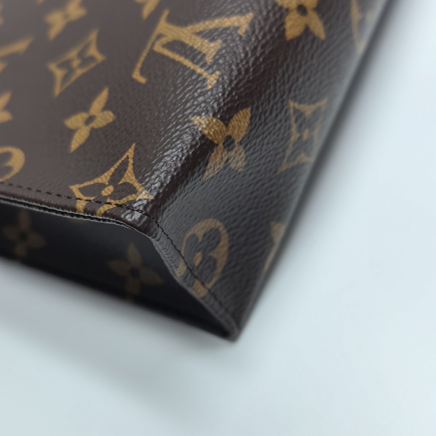 TOILET POCKET 26 Monogram Coated Canvas Brown