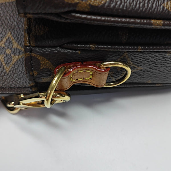 MÉTIS EAST WEST Monogram Coated Canvas Brown
