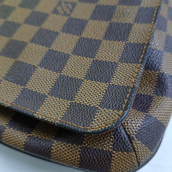 Authenticated pre-owned  MUSETTE TANGO Damier Ebene Coated Canvas Brown - Crossbody Bag at Looply