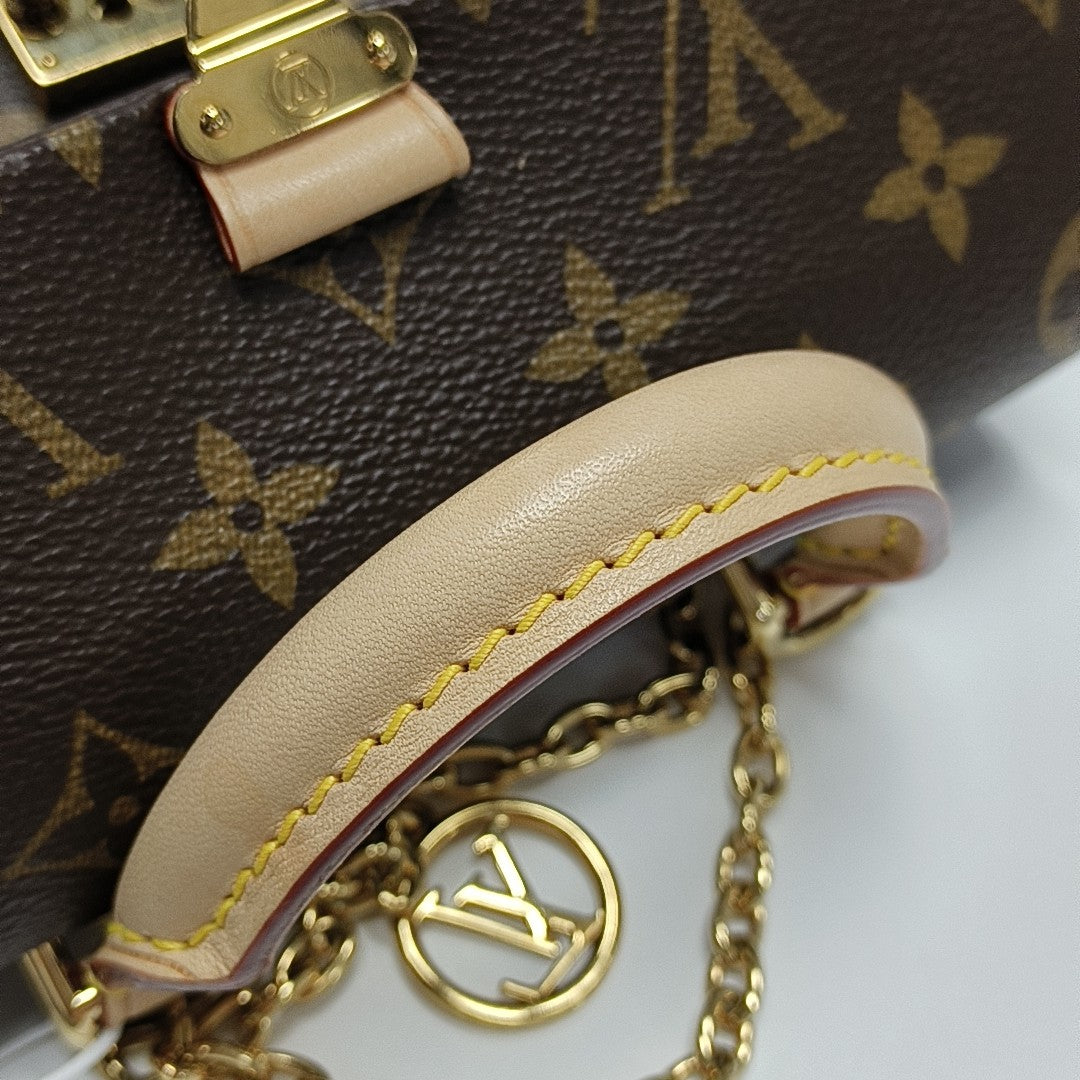 MADELEINE Monogram Coated Canvas Brown