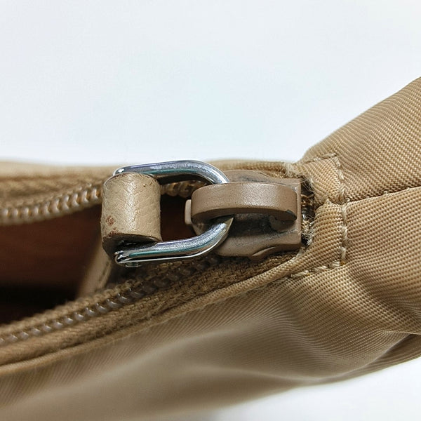 Authenticated pre-owned  Re-Edition2000 Mini Nylon Beige - Top Handle Bag at Looply