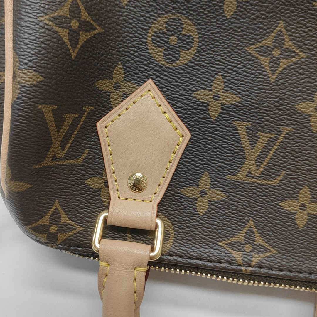 SPEEDY 20 Monogram Coated Canvas Brown
