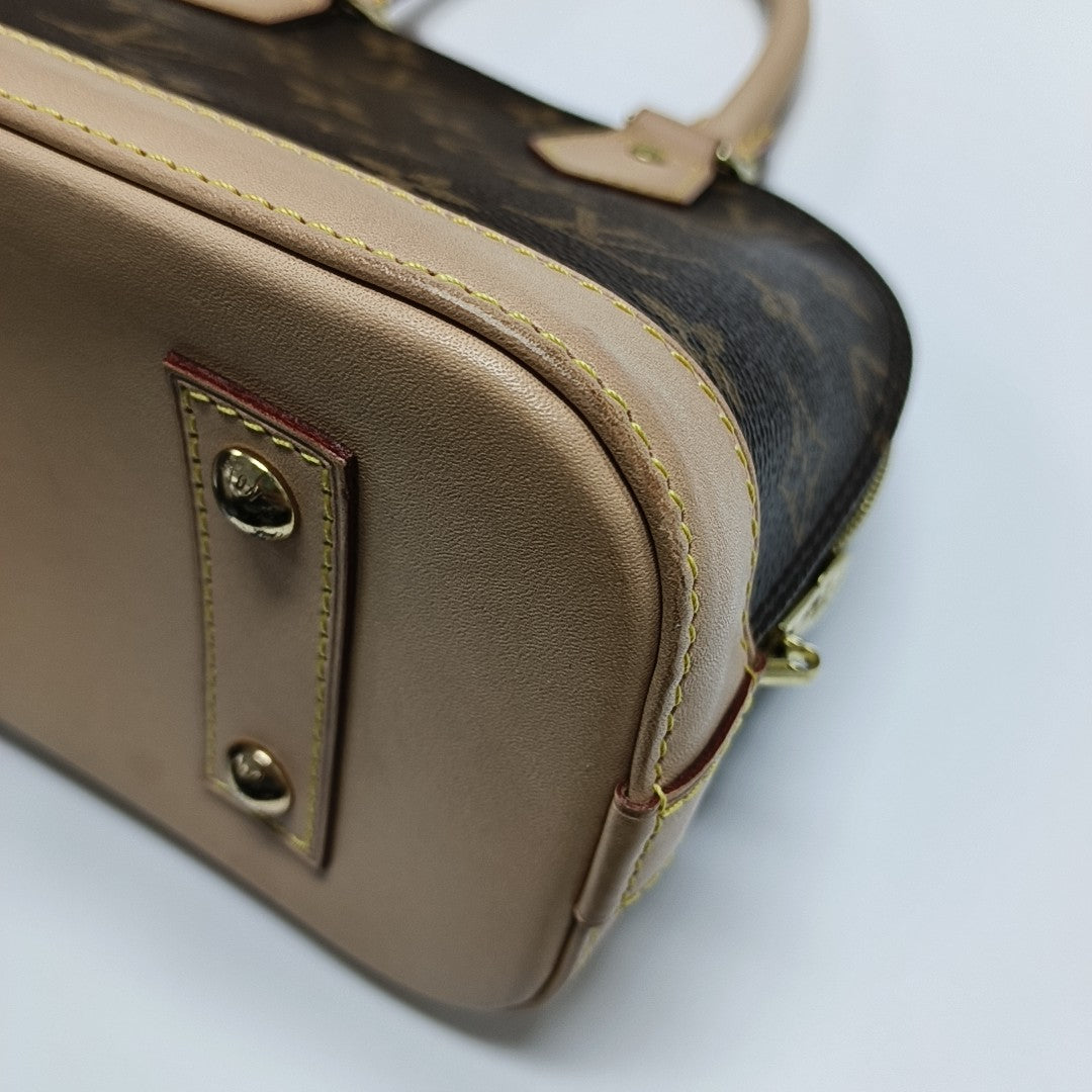 ALMA BB Monogram Coated Canvas Brown