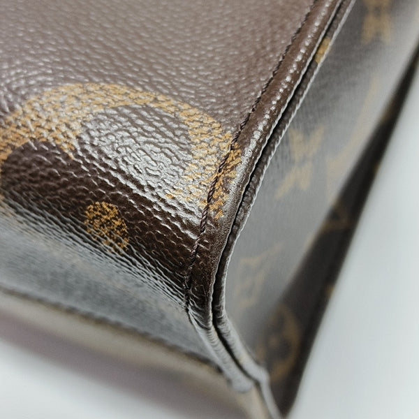 ONTHEGO PM Monogram Coated Canvas Brown