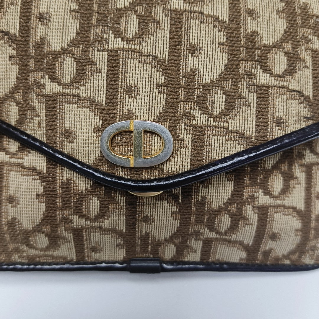 Oblique Canvas Clutch Brown