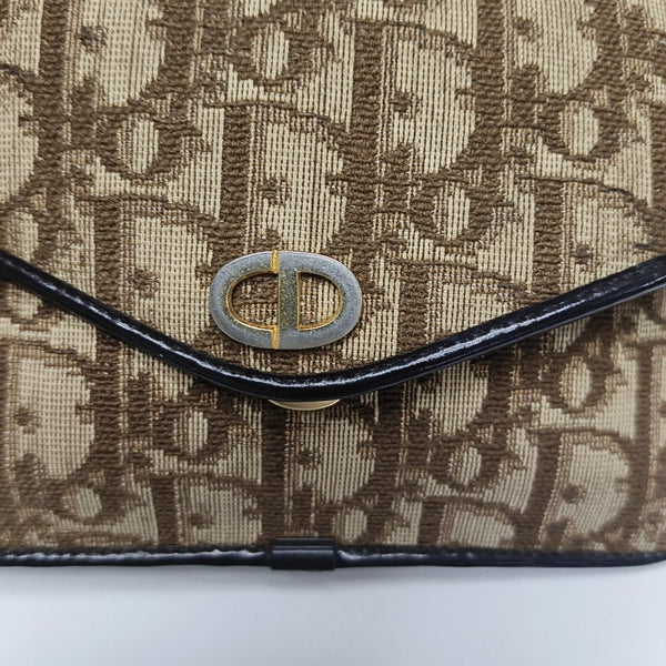 Oblique Canvas Clutch Brown