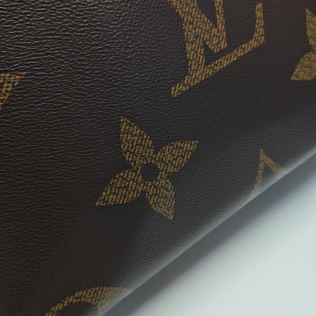 ONTHEGO MM Monogram Coated Canvas Brown