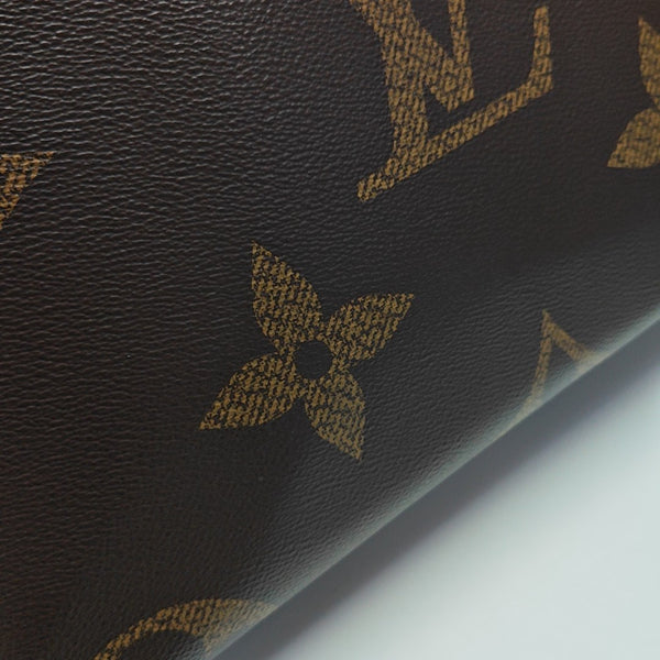 ONTHEGO MM Monogram Coated Canvas Brown