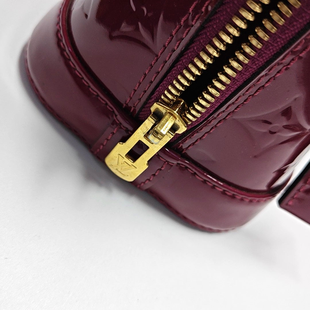 Authenticated pre-owned  ALMA BB Monogram Patent Leather Burgundy - Shoulder Bag at Looply