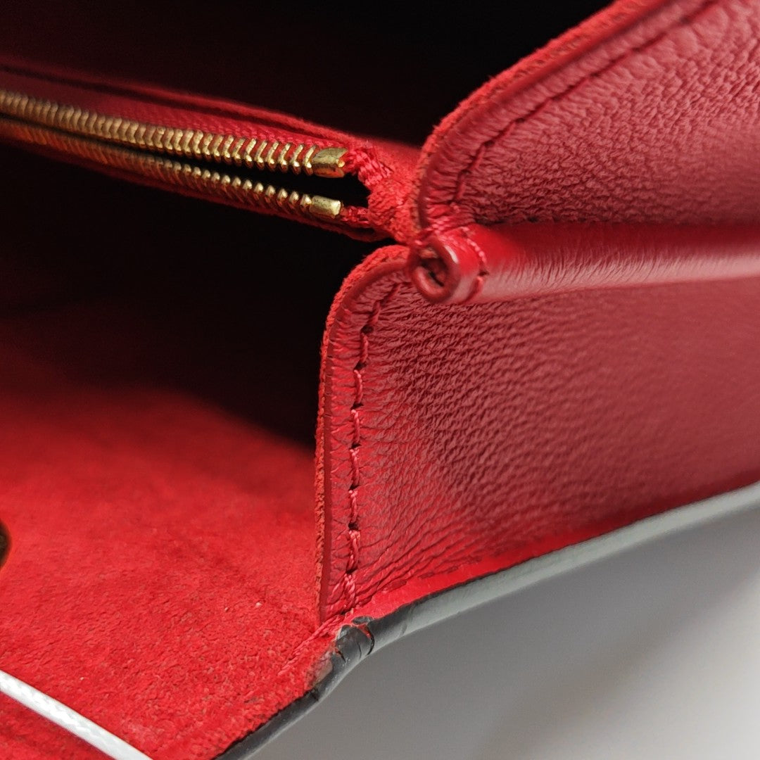 VICTOIRE Monogram Coated Canvas Brown