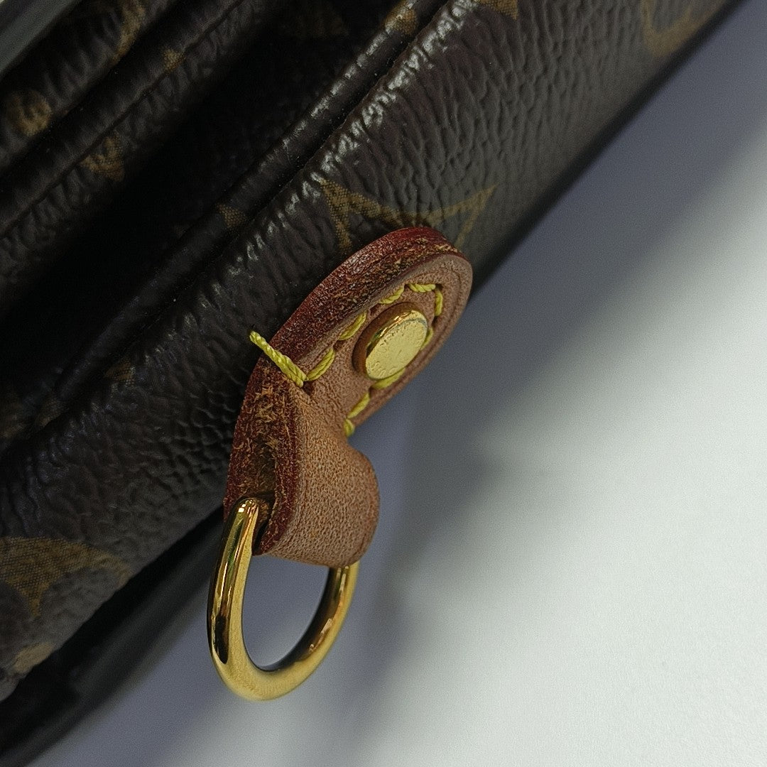 MÉTIS MM Monogram Coated Canvas Brown