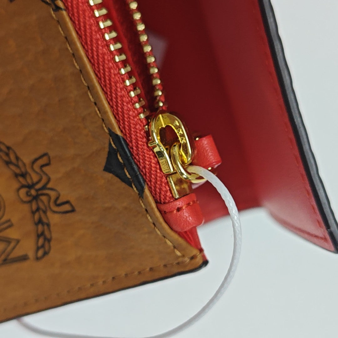 Monogram Coated Canvas Wallet Brown