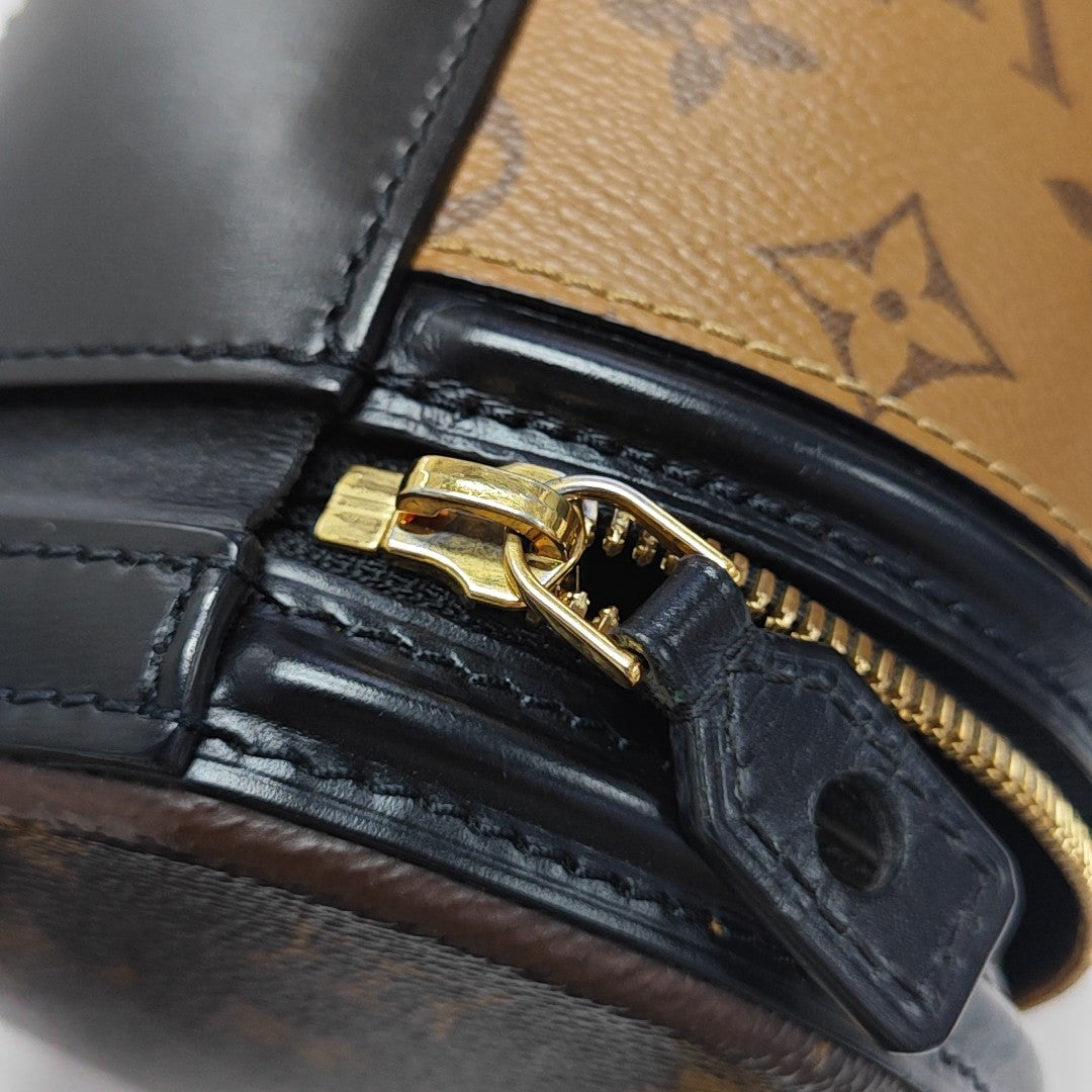 CANNES PM Monogram Coated Canvas Brown