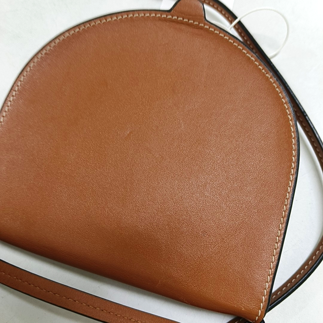Authenticated pre-owned  Heel Small Calfskin Brown - Crossbody Bag at Looply