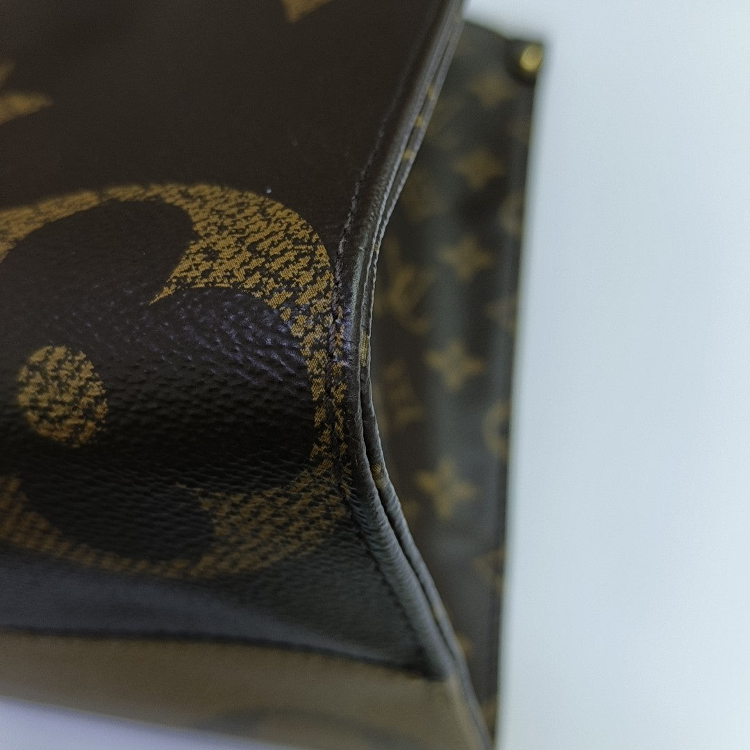 ONTHEGO MM Lona Monogram Revestida Marrón