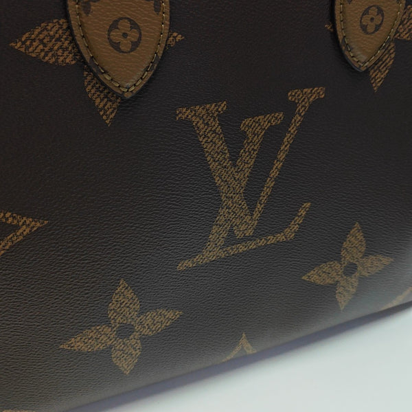 ONTHEGO MM Monogram Coated Canvas Brown
