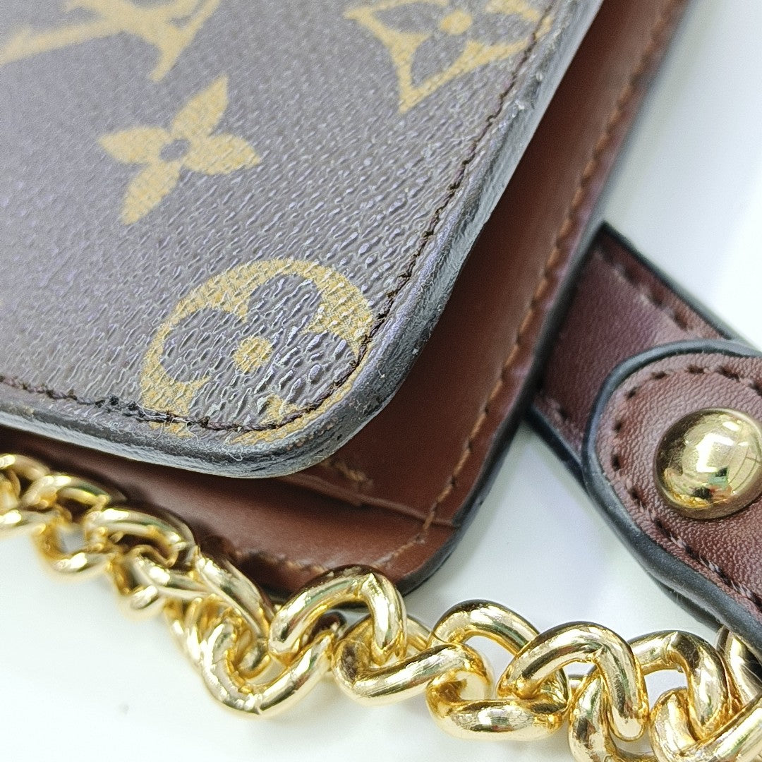 Monogram Coated Canvas Clutch Brown
