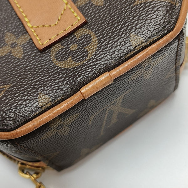 BOITE CHAPEAU Mini Monogram Coated Canvas Brown