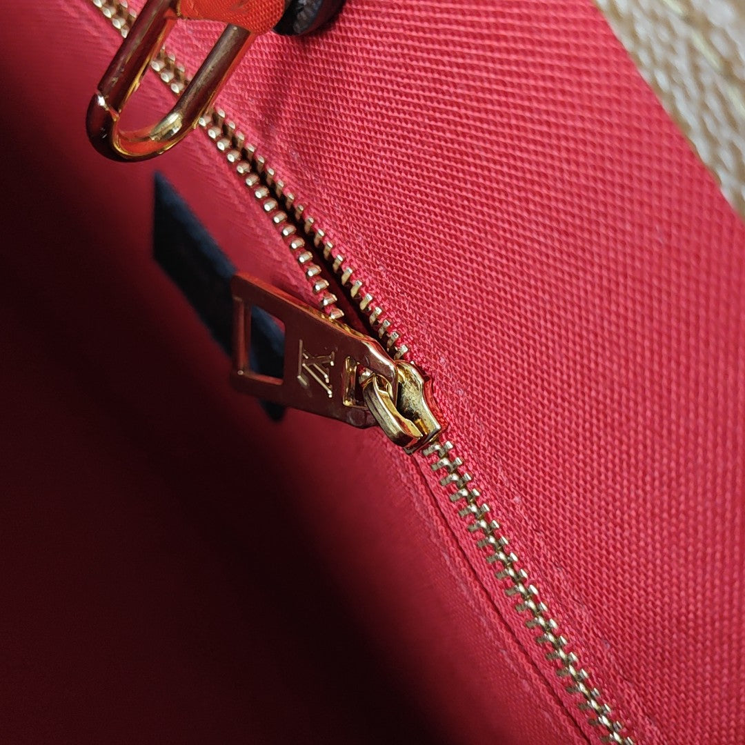 ONTHEGO PM Monogram Coated Canvas Brown