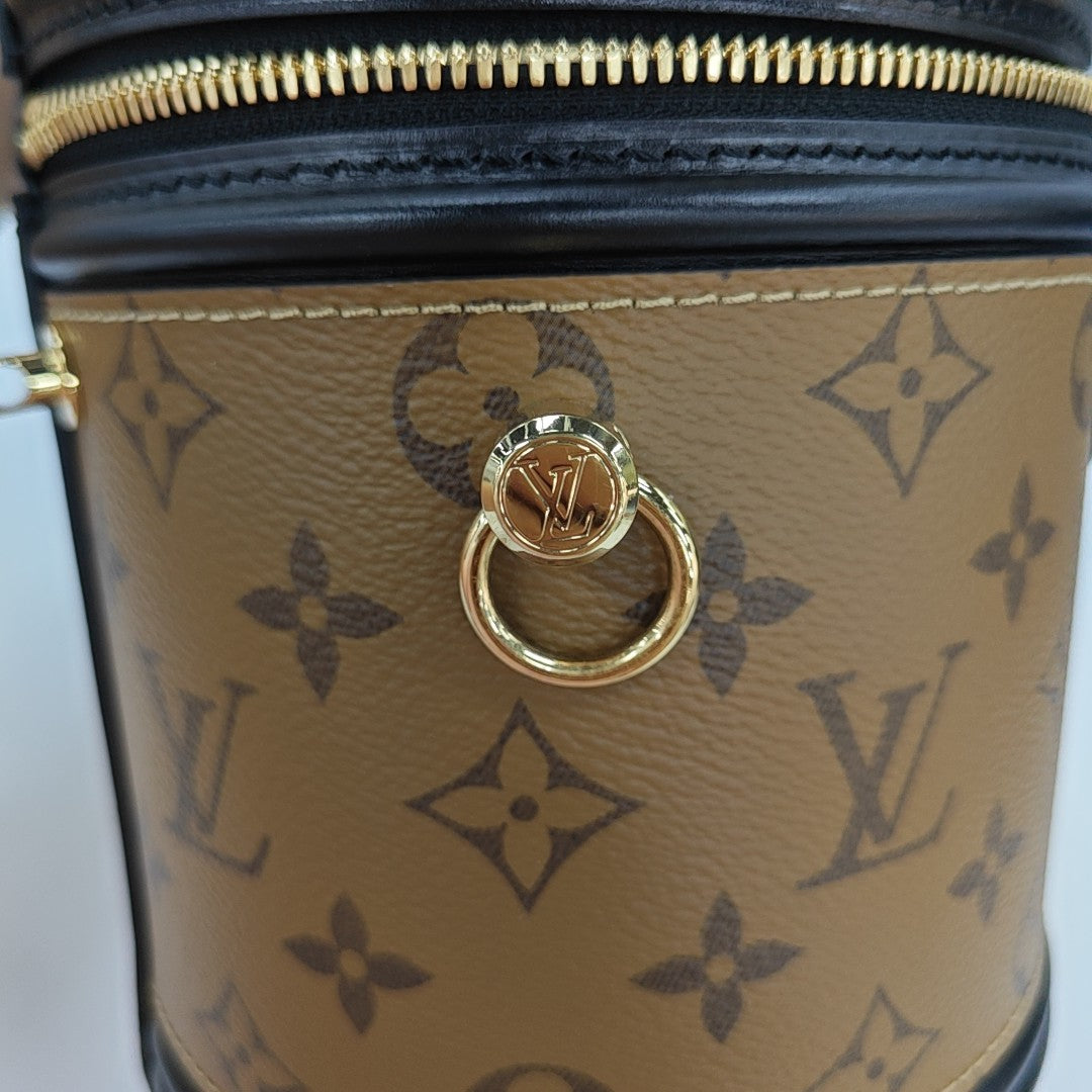 CANNES PM Monogram Coated Canvas Brown