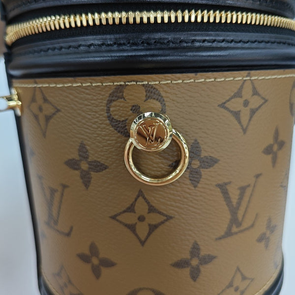 CANNES PM Monogram Coated Canvas Brown