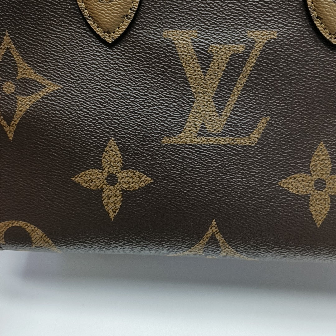 ONTHEGO PM Monogram Coated Canvas Brown