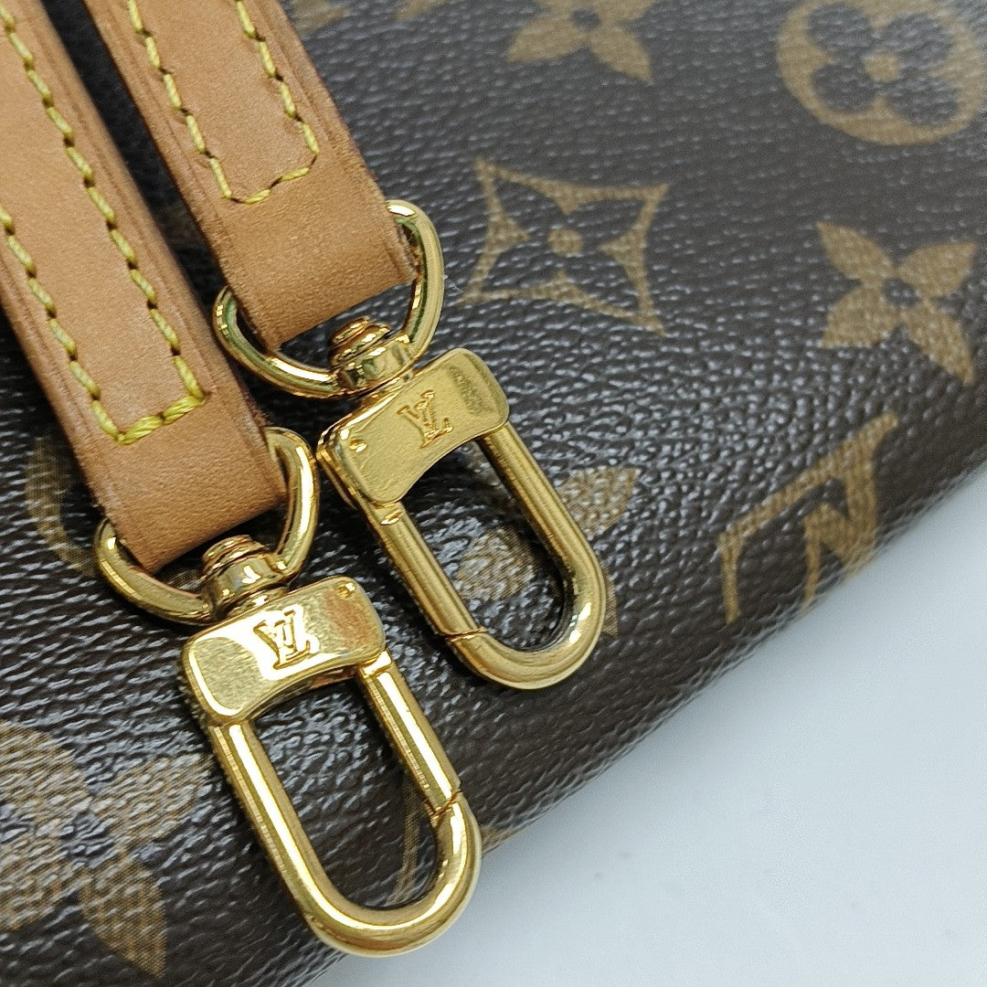 EVA Monogram Coated Canvas Brown