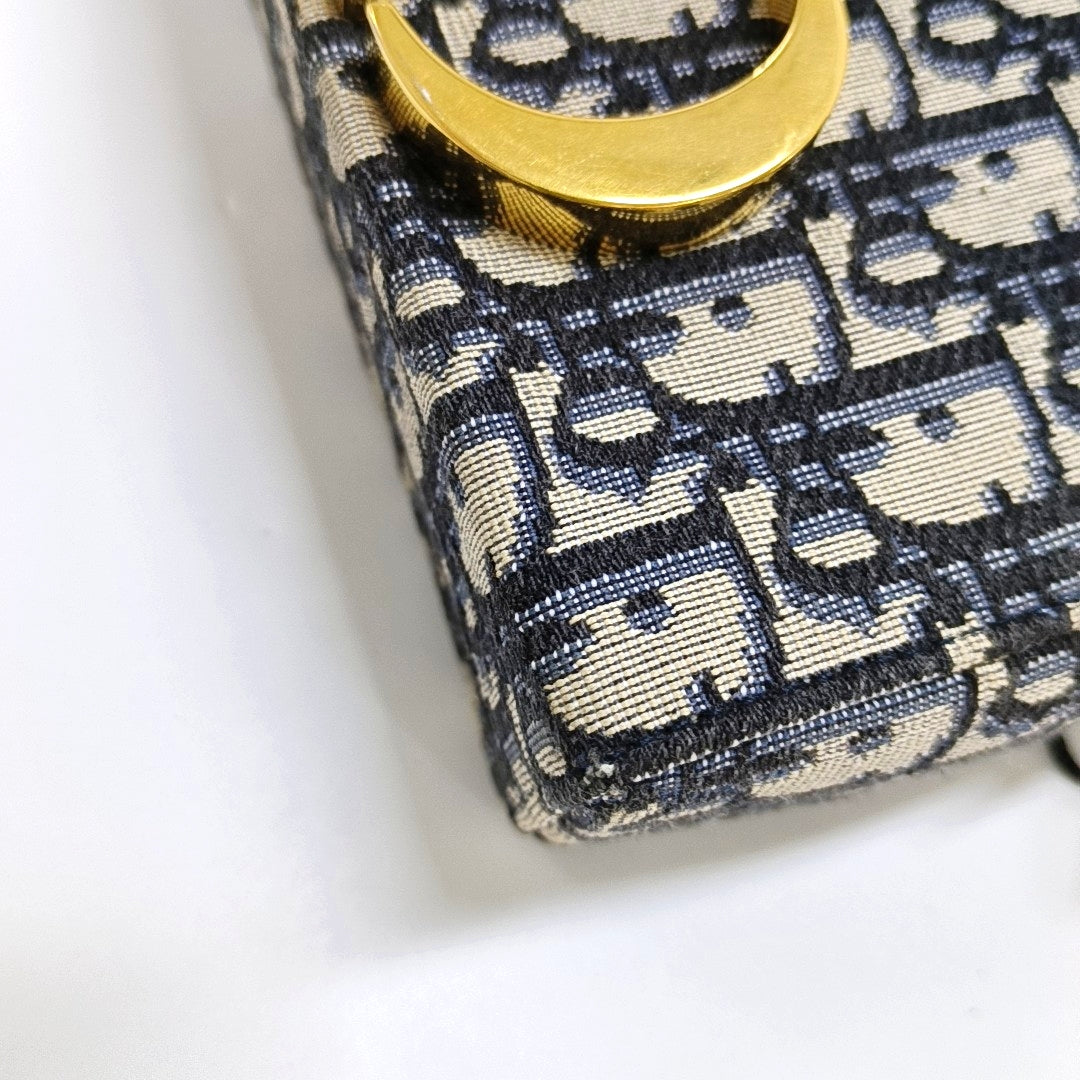 Authenticated pre-owned  30 Montaigne Oblique Canvas Blue - Clutch at Looply