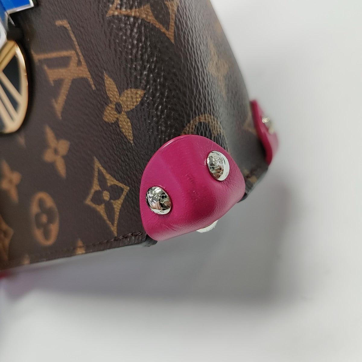 TRIBAL MASK PM Monogram Coated Canvas Brown