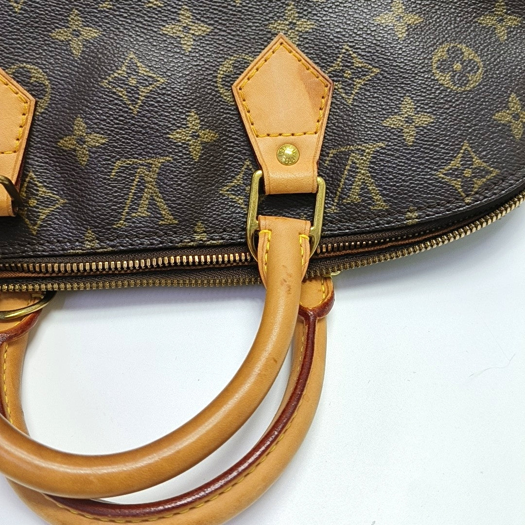 ALMA PM Monogram Coated Canvas Brown