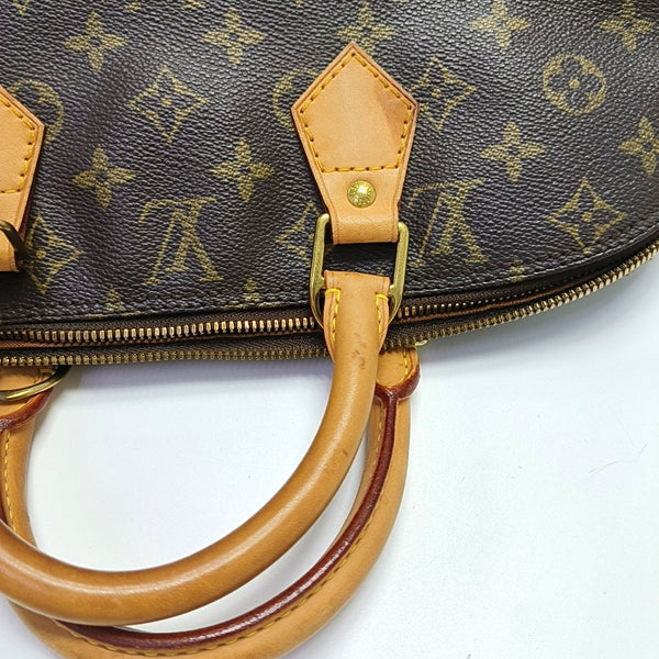 ALMA PM Monogram Coated Canvas Brown