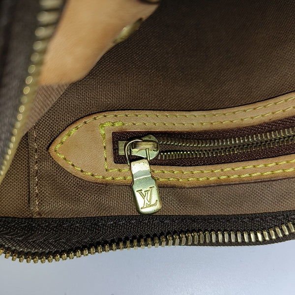 SPEEDY 25 Monogram Coated Canvas Brown