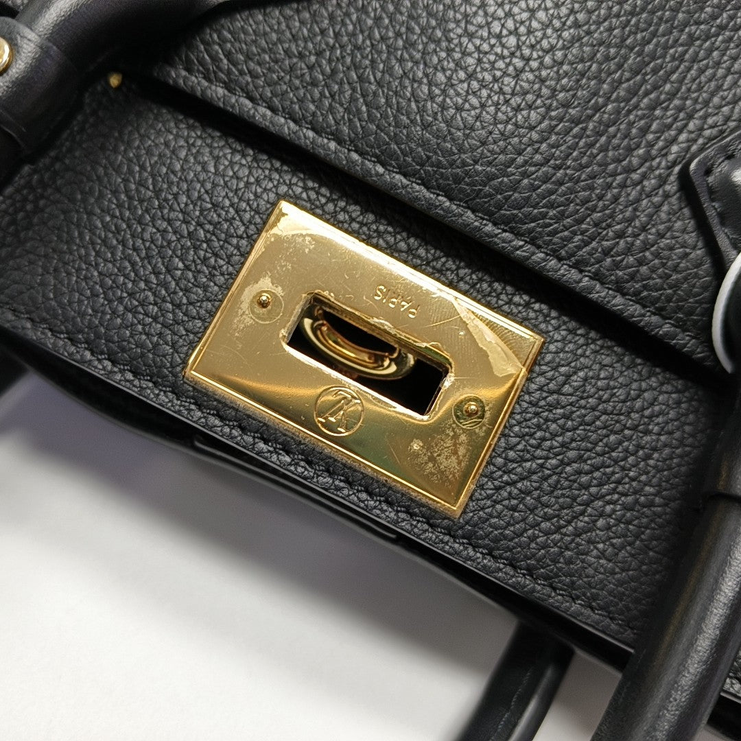 ON MY SIDE PM Monogram Coated Canvas Black