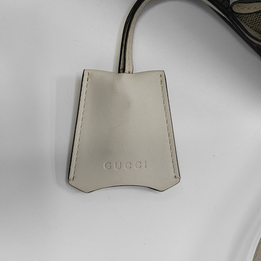Padlock Small Monogram Coated Canvas Beige