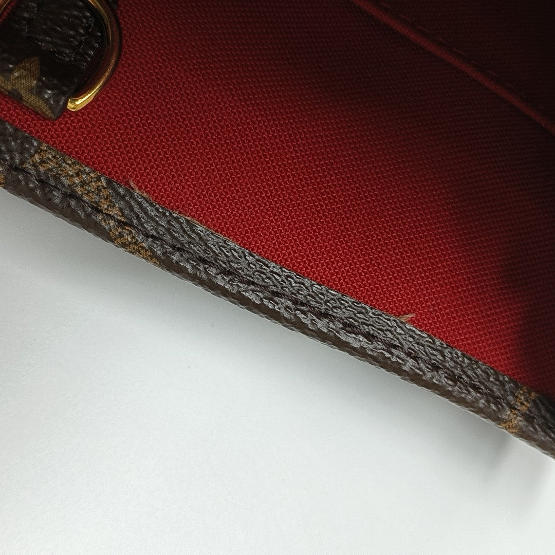 ONTHEGO PM Monogram Coated Canvas Brown