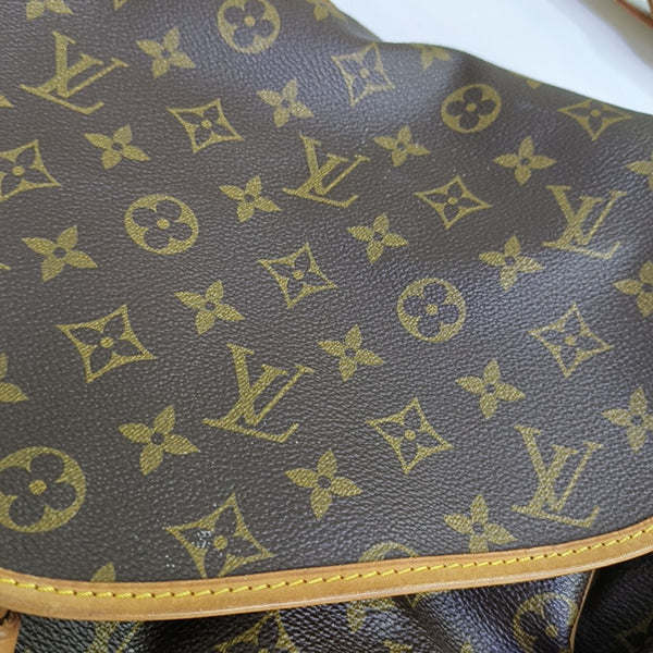 SAUMUR 35 Monogram Coated Canvas Brown