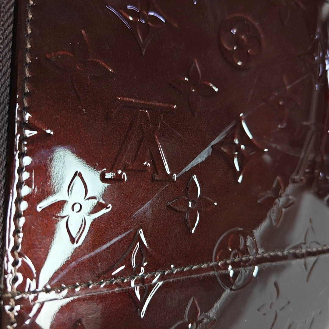 Authenticated pre-owned  PEGASE 45 Patent Leather Burgundy - Luggage at Looply
