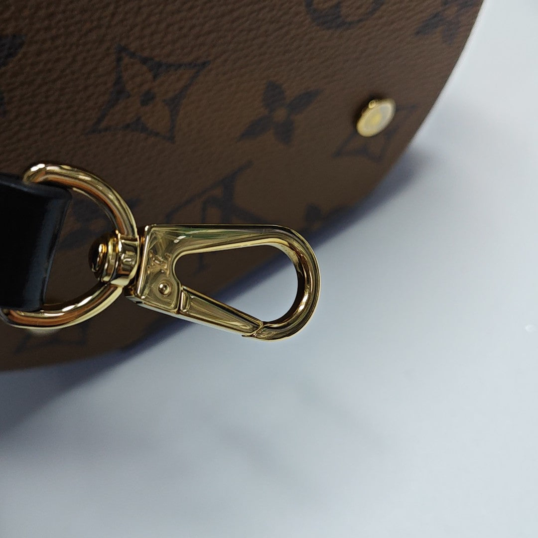 CANNES PM Monogram Coated Canvas Brown